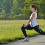 woman stretching and getting ready to exercise outside